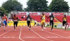 no 45 Owin Sinclair (Leic) wins the Junior Boys 100 metres.